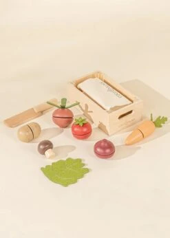 Sliceable Wooden Vegetables -Odin Parker 8125d0c3569eb7444ad38c74066ee4eb408c42d3b8484066a6db80365e4ac3e5 jpeg
